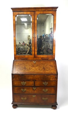 Lot 2474 - A mid-18th century figured walnut writing...