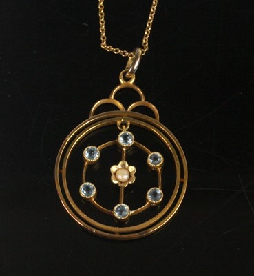 Lot 2190 - An Edwardian 15ct gold circular openwork...