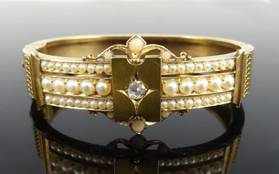 Lot 2176 - A yellow metal, diamond, coral and pearl...