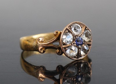 Lot 2197 - A 22ct gold, sapphire and paste circular...