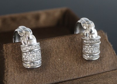 Lot 2229 - A pair of 18ct white gold Fope Flex-It diamond...