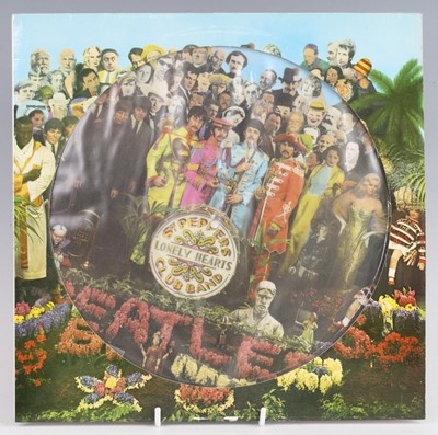Lot 1343 - A collection of four picture disc LP's to...