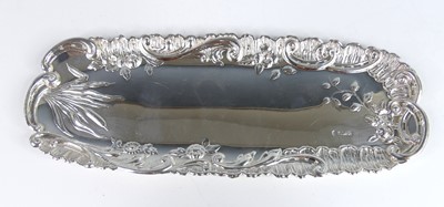 Lot 2106 - An Elizabeth II silver pen tray, of shaped...