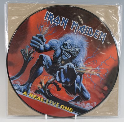 Lot 1257 - Iron Maiden, a collection of three 12" picture...