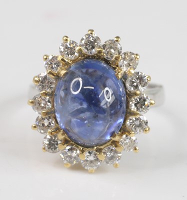 Lot 2209 - A yellow and white metal, sapphire and diamond...