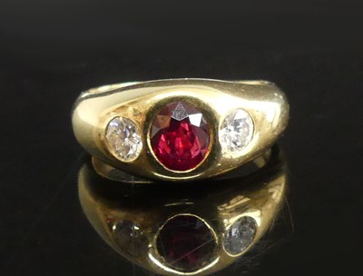 Lot 2172 - A yellow metal, ruby and diamond dress ring,...