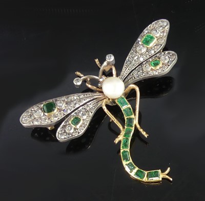 Lot 2163 - A yellow and white metal, emerald and diamond...