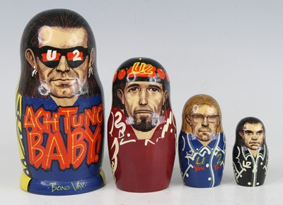 Lot 1251 - U2, Achtung Baby, a set of four matryoshka...