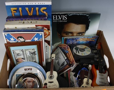 Lot 1361 - A large collection of Elvis memorabilia to...