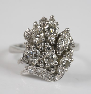 Lot 2213 - A white metal diamond abstract cluster ring,...