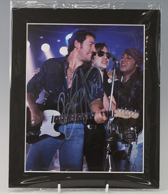 Lot 1142 - Bruce Springsteen, a 25 x 20cm photograph of...