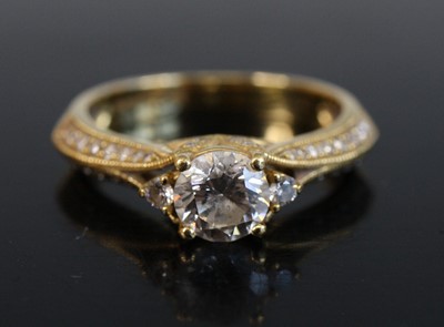 Lot 2232 - An 18ct yellow gold diamond solitaire ring,...