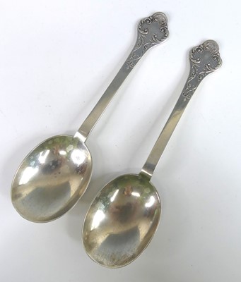 Lot 2064 - A pair of Edwardian silver fancy-back dognose...