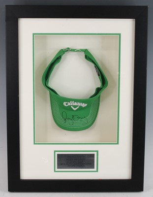 Lot 1216 - A Calloway golf cap, in green fabric with...