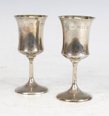 Lot 130 - A pair of 1970s silver goblets, the waisted...