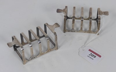 Lot 209 - A pair of Art Deco silver toast racks, each...
