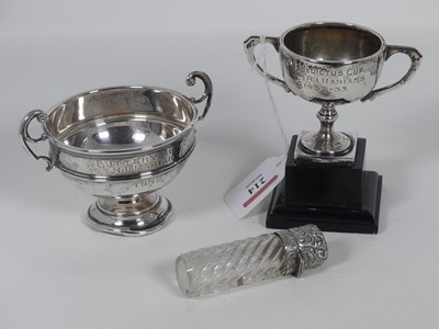 Lot 214 - A George V silver twin-handled trophy cup,...