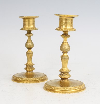 Lot 2268 - A pair of Victorian gilt bronze candlesticks...