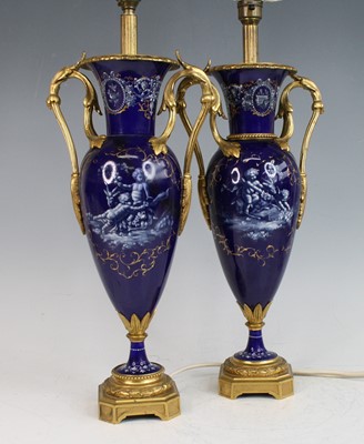 Lot 2271 - A pair of French gilt metal and porcelain...
