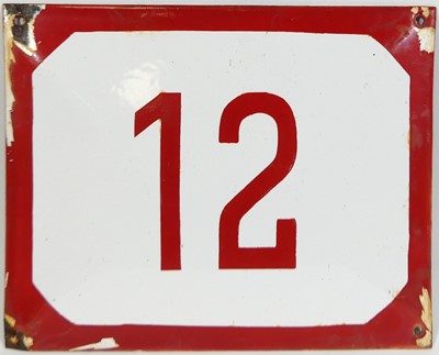 Lot 227 - An early 20th century enamel on metal door...