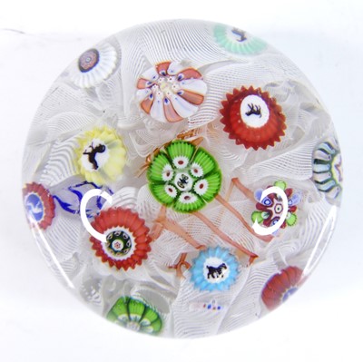 Lot 80 - Baccarat of France - a glass paperweight, the...