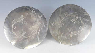 Lot 168 - A pair of continental white metal circular...