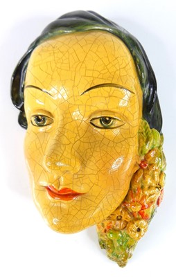 Lot 22 - A 1930s Wade cellulose wall mask, modelled as...