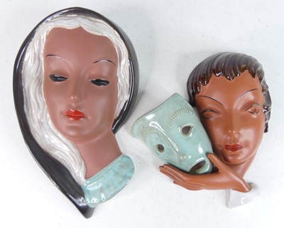 Lot 33 - Two Goldscheider pottery wall masks, the first...