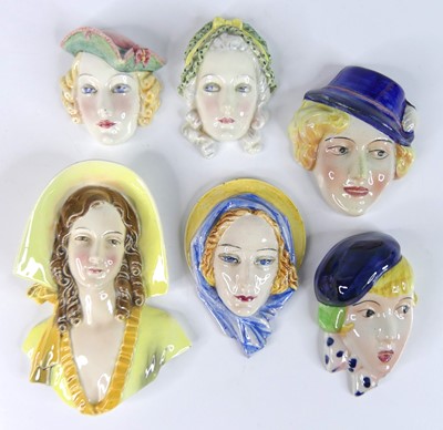Lot 30 - A collection of six various miniature glazed...