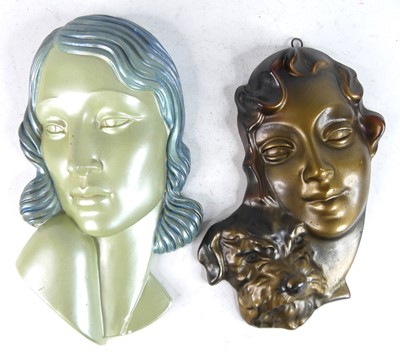 Lot 23 - Two 1930s painted plaster wall masks, each...