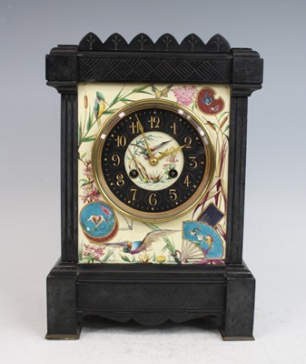 Lot 2384 - A Victorian Aesthetic Movement polished black...