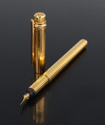 Lot 2274 - A Must de Cartier Trinity fountain pen, with...