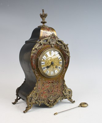 Lot 2385 - A circa 1900 French boulle mantel clock, of...