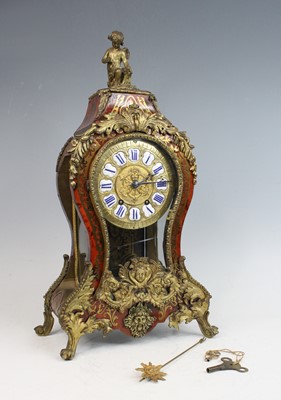 Lot 2387 - A circa 1900 French boulle mantel clock, of...