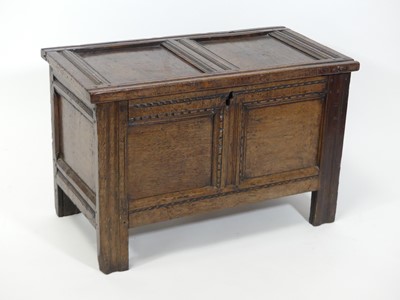 Lot 2480 - A circa 1700 joined oak two-panel coffer, the...