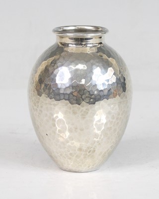 Lot 133 - A small hammered sterling silver vase, of...