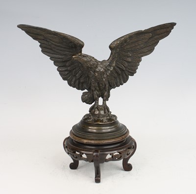 Lot 2277 - An early 20th century bronze eagle, its wings...