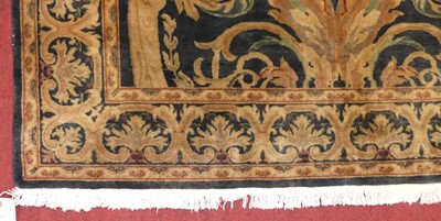 Lot 1149 - A Persian woollen blue and cream ground floral...