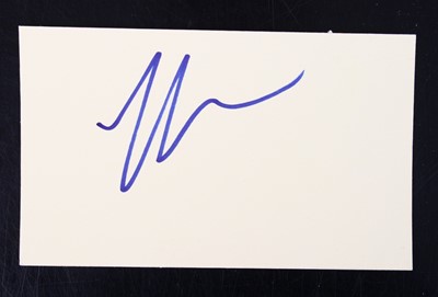Lot 1327 - Elon Musk, autograph in blue marker on yellow...