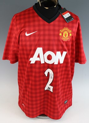 Lot 1244 - Rafael da Silva, a replica Manchester United...