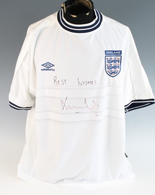 Lot 1132 - Kieron Dyer, a replica England shirt, signed...