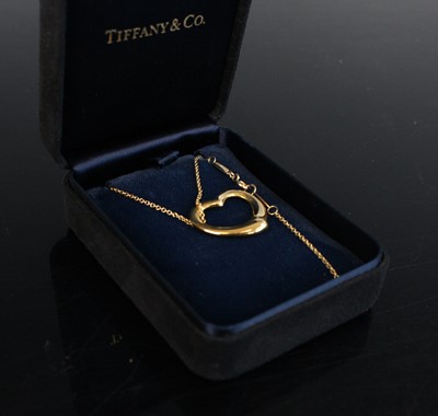 Lot 2231 - A yellow metal Tiffany Elsa Peretti open heart...