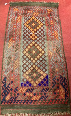 Lot 1341 - A Turkish red ground woollen Kilim rug, 185 x...