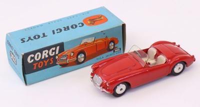 Lot 505 - Corgi Toys 302, M.G.A sports car in red, flat...