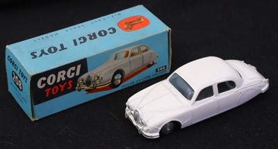 Lot 833 - Corgi Toys, 208 Jaguar 2.4 litre, white body...