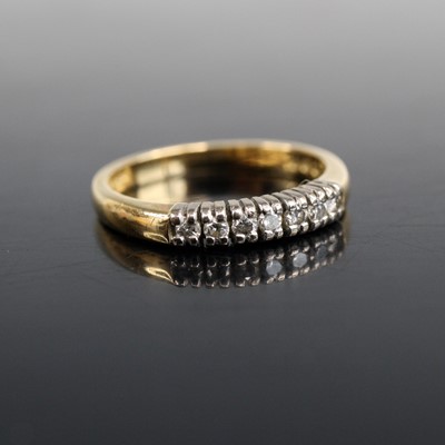 Lot 2010 - An 18ct yellow and white gold diamond half...