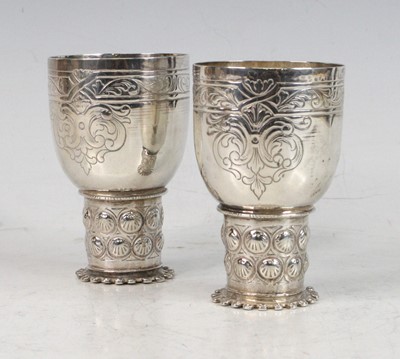 Lot 101 - A pair of Arts & Crafts influenced sterling...