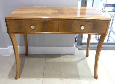Lot 399 - An Art Deco figured and burr walnut two drawer...