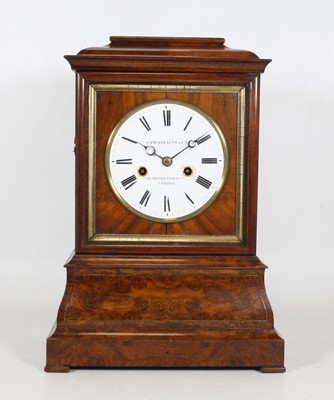 Lot 1 - A 19th century walnut case mantel clock, the...