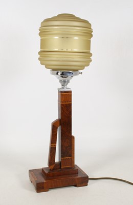 Lot 14 - An Art Deco walnut table lamp, of asymmetrical...